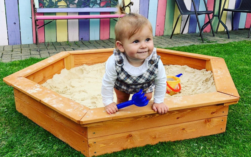 Plastic Vs. Wooden Playhouses