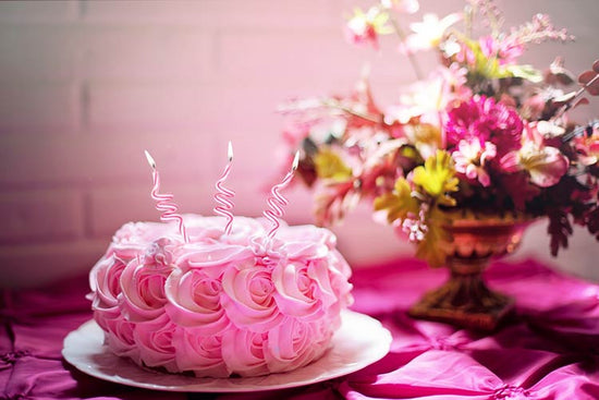 Pink birthday cake with icing
